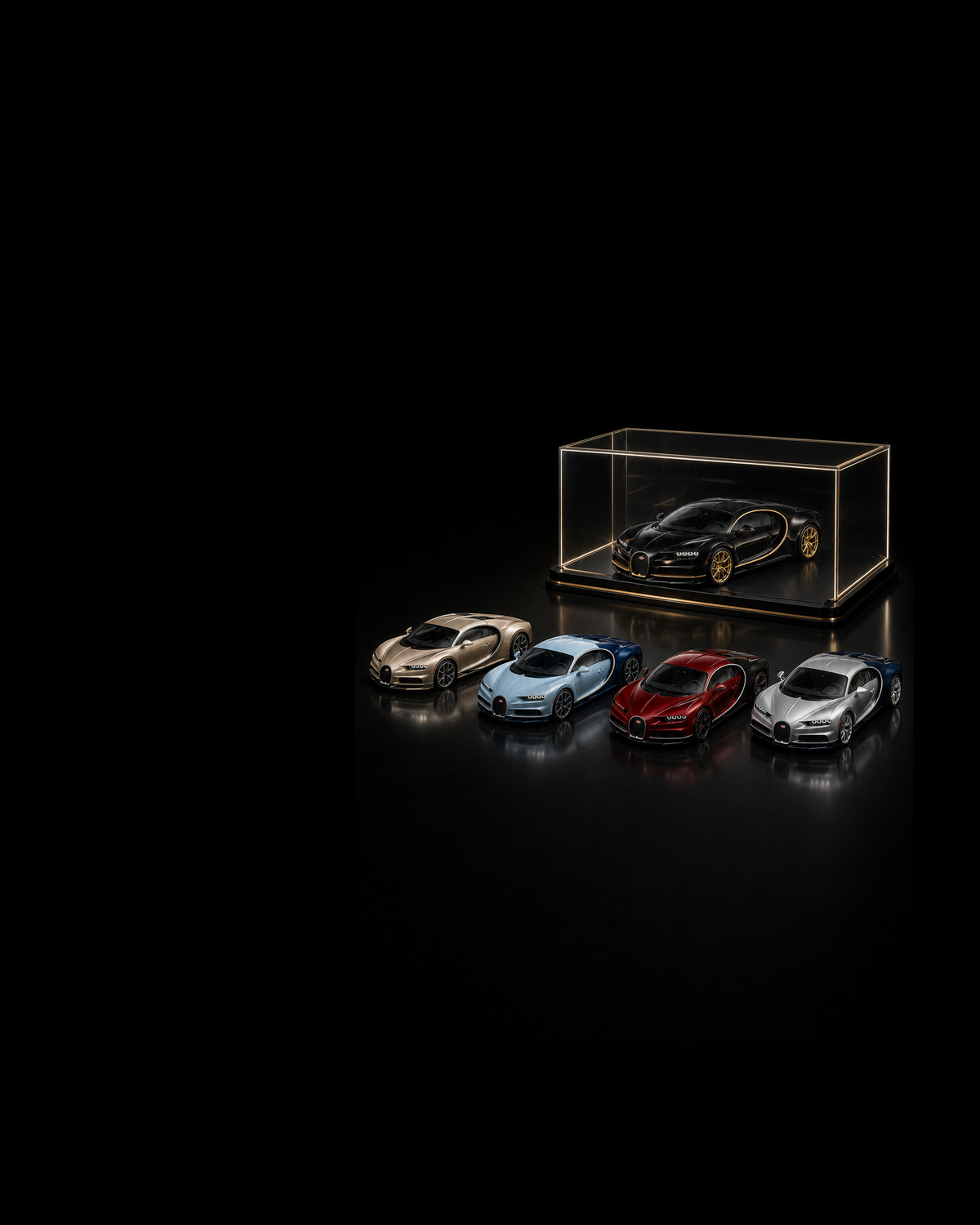 Five black, champagne, blue, red and silver Bugatti-form collectibles in one black-lacquer miniature atelier.