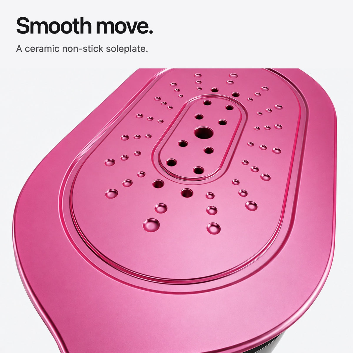 Carter & Cole magenta ceramic soleplate with elongated outline and recessed steam port field