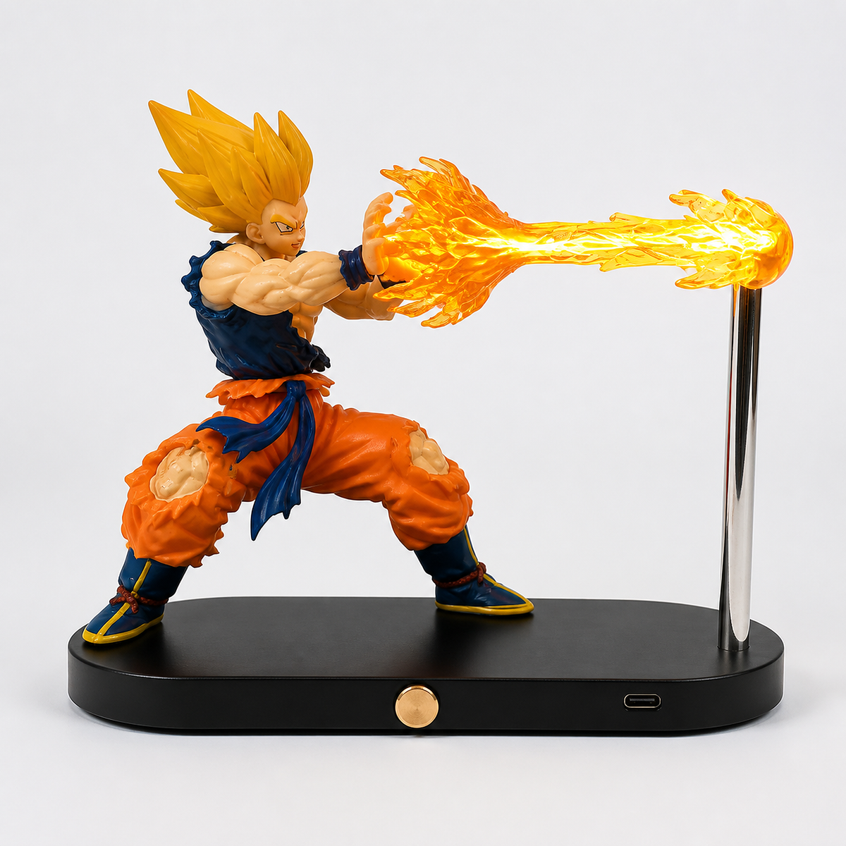 Super Saiyan Goku orange-energy display lamp with the gold base control and USB-C port visible.