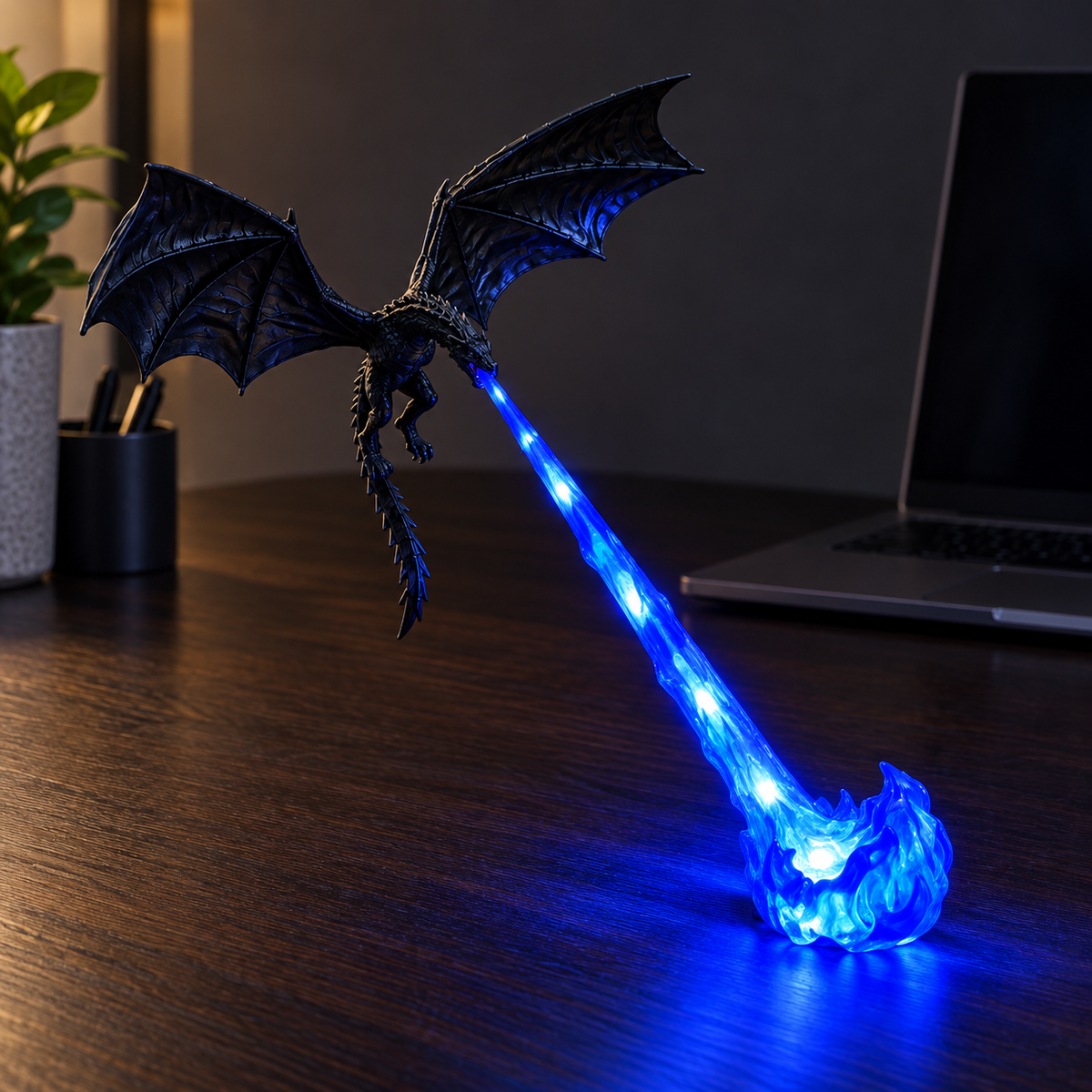 Blue Flame Dragonfire lamp glowing on a dark desk