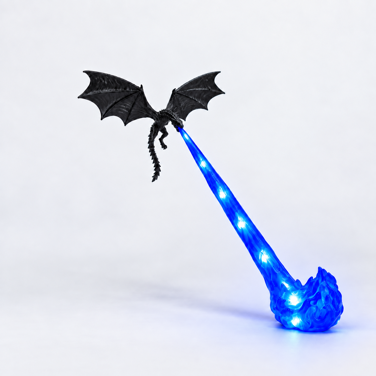 Small Blue Flame Dragonfire lamp, complete studio view, with bright LED points in the translucent flame beam and foot.