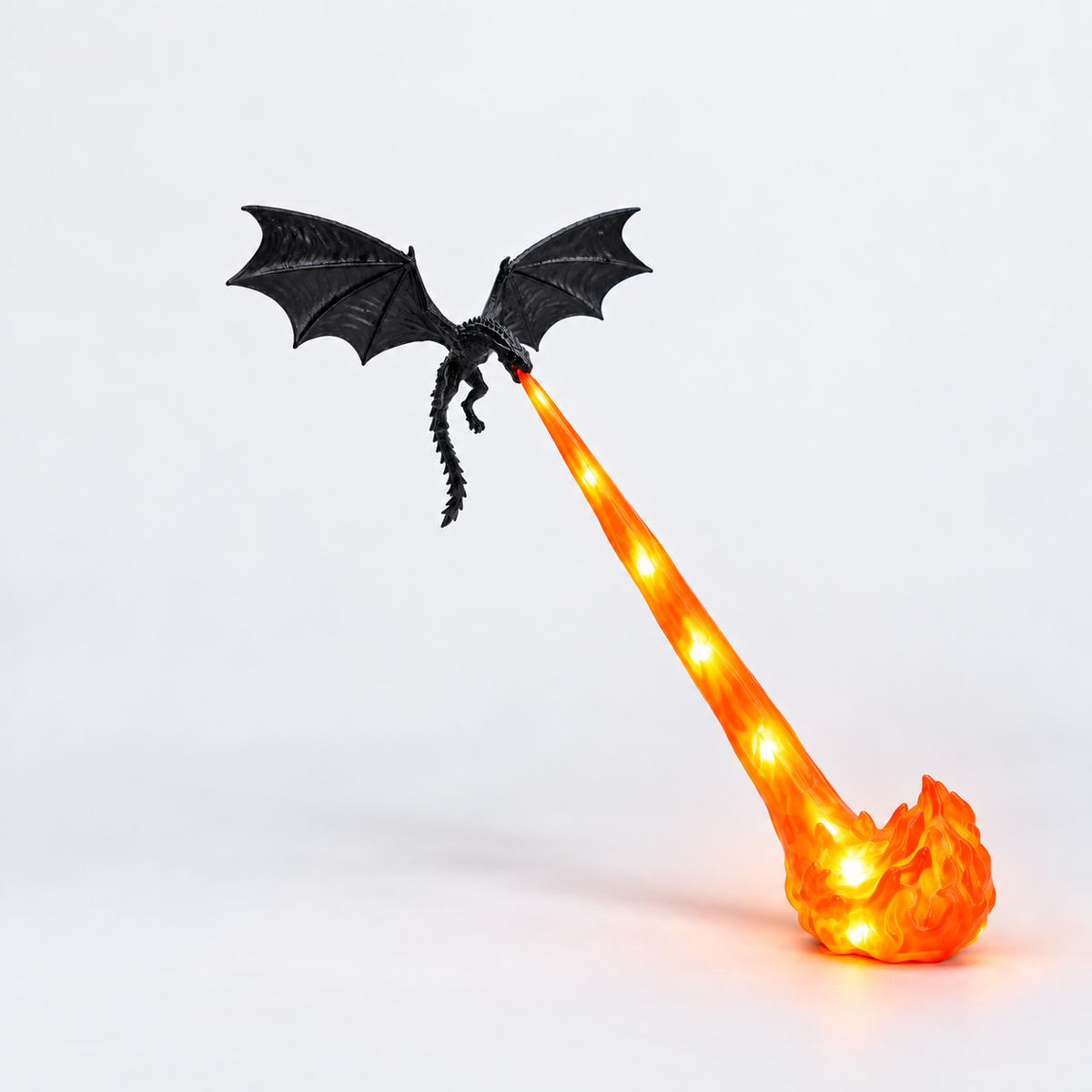Small Orange Flame Dragonfire lamp, complete studio view, with bright LED points in the translucent flame beam and foot.