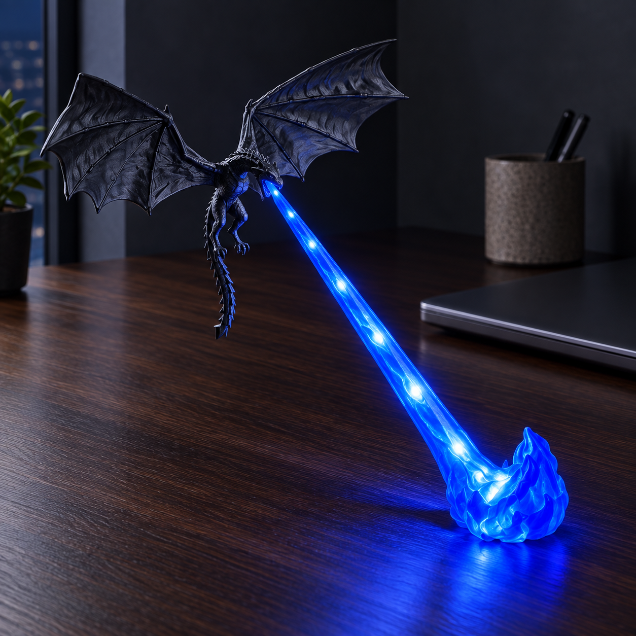 XL Blue Flame Dragonfire lamp, displayed on a dark desk, with bright LED points in the translucent flame beam and foot.
